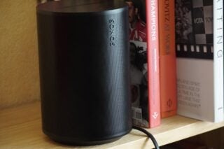Sonos Era 100 on bookshelf